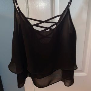 A black tank top that is sheer and great for the summer time